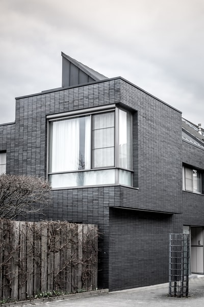 Two-story residential gray-scale photography
